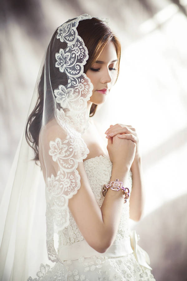 A Bride Selecting Her Wedding Veil